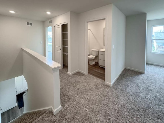 1052 58th Rd Unit 0021, Union Grove, WI 53182 - corridor featuring carpet flooring, an upstairs landing, and recessed lighting