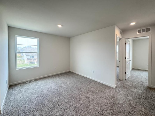 1052 58th Rd Unit 0021, Union Grove, WI 53182 - carpeted empty room with baseboards and recessed lighting