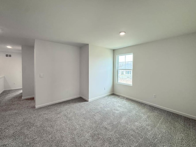 1052 58th Rd Unit 0021, Union Grove, WI 53182 - carpeted spare room featuring baseboards and recessed lighting
