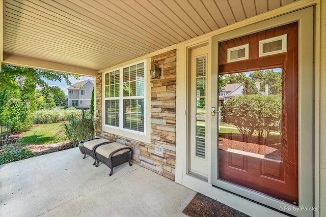 2636 Bainbridge Blvd, West Chicago, IL 60185 - property entrance featuring stone siding and a porch