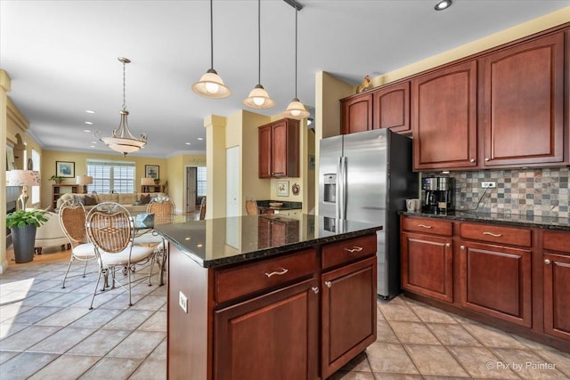 2636 Bainbridge Blvd, West Chicago, IL 60185 - kitchen with stainless steel refrigerator with ice dispenser, recessed lighting, pendant lighting, reddish brown cabinets, and tasteful backsplash