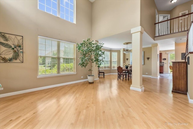 2636 Bainbridge Blvd, West Chicago, IL 60185 - foyer entrance with a towering ceiling, wood finished floors, and ornate columns