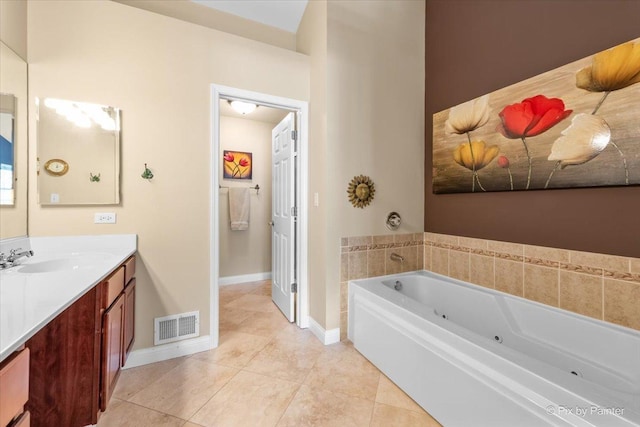 2636 Bainbridge Blvd, West Chicago, IL 60185 - bathroom with vanity, a whirlpool tub, and tile patterned flooring