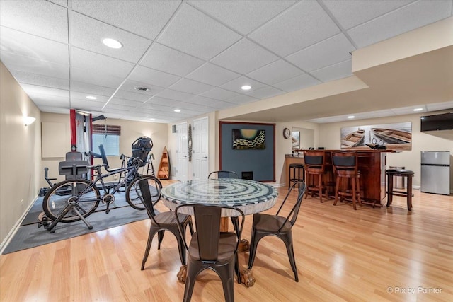 2636 Bainbridge Blvd, West Chicago, IL 60185 - dining area with a bar, light wood-style flooring, a drop ceiling, and recessed lighting