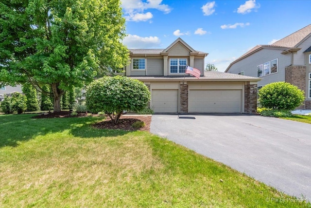 2636 Bainbridge Blvd, West Chicago, IL 60185 - view of front of home with driveway and a front lawn