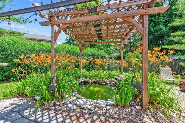 2636 Bainbridge Blvd, West Chicago, IL 60185 - view of patio / terrace with a pergola and a small pond