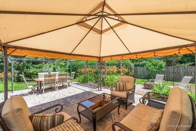 2636 Bainbridge Blvd, West Chicago, IL 60185 - view of patio / terrace featuring a gazebo, outdoor dining area, and an outdoor hangout area