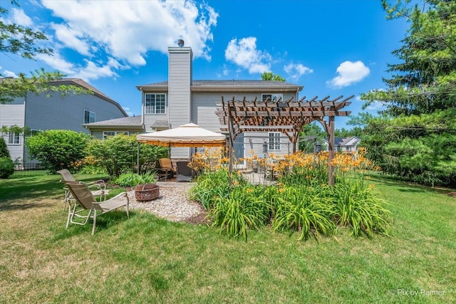 2636 Bainbridge Blvd, West Chicago, IL 60185 - back of property with an outdoor fire pit, a pergola, a gazebo, and a yard