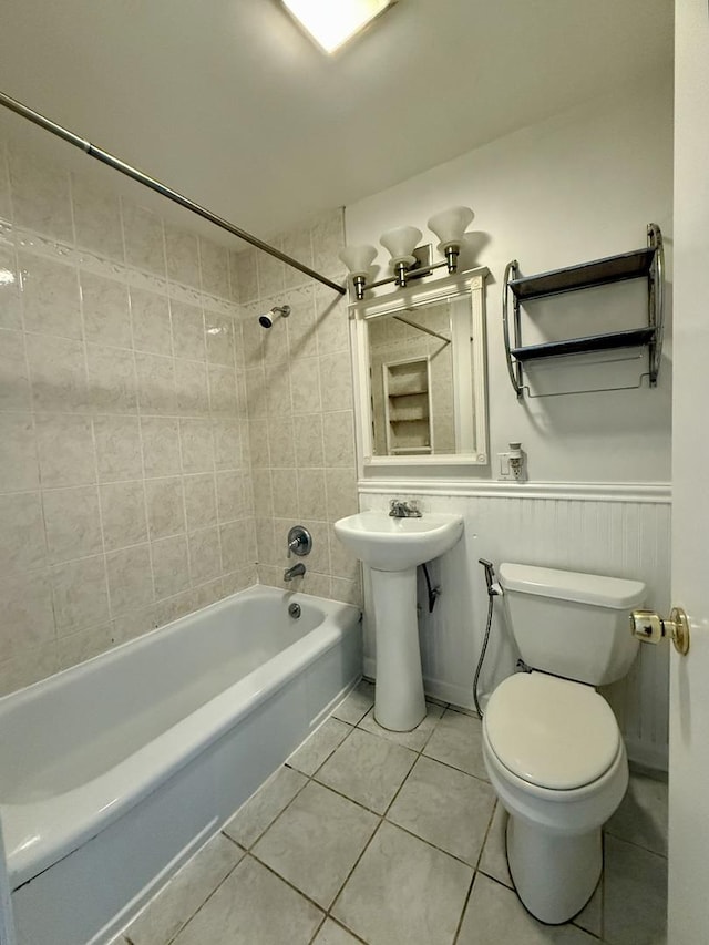 9424 Lorel Ave, Skokie, IL 60077 - full bathroom with shower / bathtub combination, tile patterned flooring, and a wainscoted wall