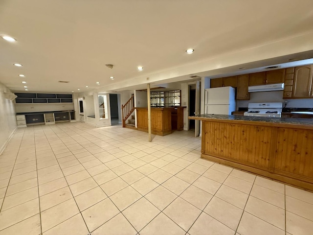 9424 Lorel Ave, Skokie, IL 60077 - kitchen with white appliances, under cabinet range hood, dark countertops, open floor plan, and recessed lighting