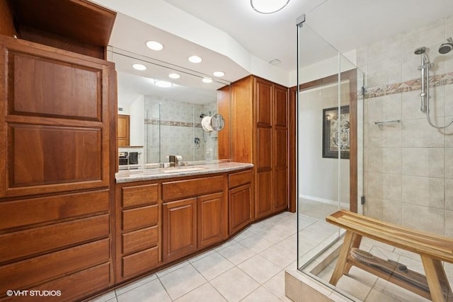 1440 N State Pkwy Unit 21C, Chicago, IL 60610 - full bath featuring tile patterned flooring, recessed lighting, a stall shower, and vanity