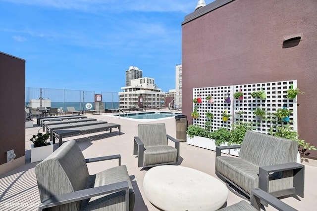 1440 N State Pkwy Unit 21C, Chicago, IL 60610 - view of patio featuring a city view and an outdoor living space