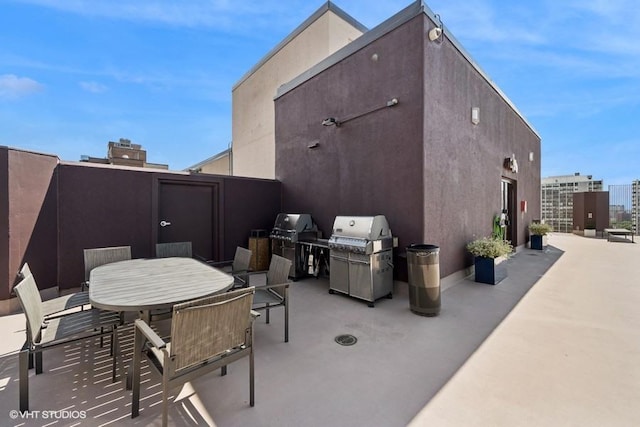 1440 N State Pkwy Unit 21C, Chicago, IL 60610 - view of patio with a grill and outdoor dining area
