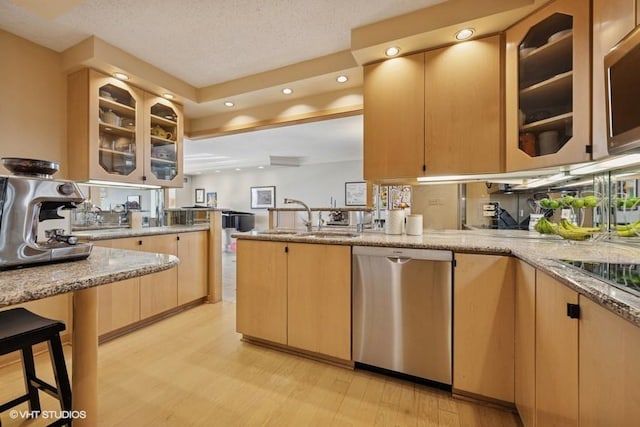 1440 N State Pkwy Unit 21C, Chicago, IL 60610 - kitchen with stainless steel dishwasher, light brown cabinets, light wood finished floors, light stone countertops, and recessed lighting