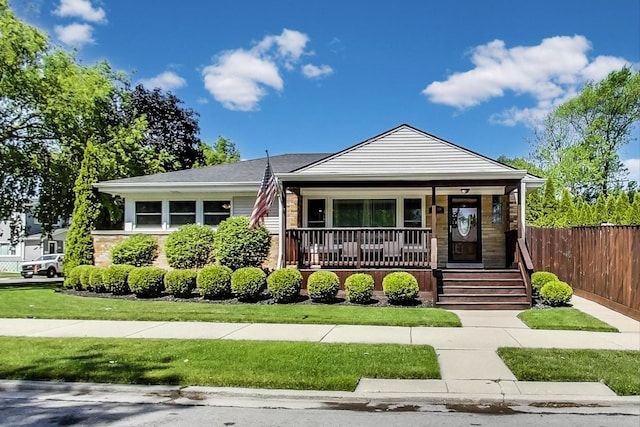 7100 W Arthur Ave, Chicago, IL 60631 - bungalow with a porch and stone siding