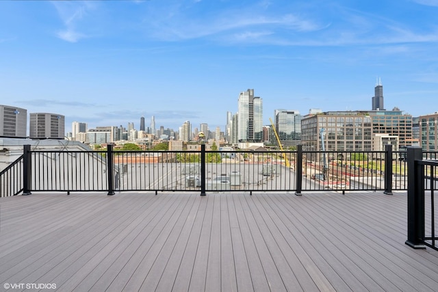 401 N Aberdeen St Unit 4S, Chicago, IL 60642 - wooden terrace with a skyline view