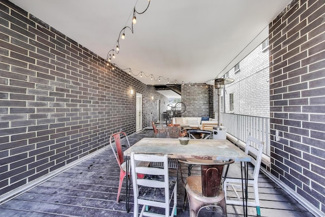 1800 N California Ave Unit 1E, Chicago, IL 60647 - wooden terrace with outdoor dining space