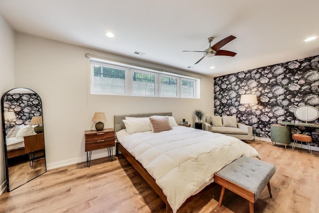 1800 N California Ave Unit 1E, Chicago, IL 60647 - bedroom with light wood-style flooring, recessed lighting, and ceiling fan