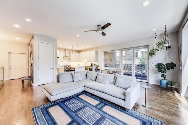 1800 N California Ave Unit 1E, Chicago, IL 60647 - living room with light wood-style flooring, recessed lighting, and a ceiling fan