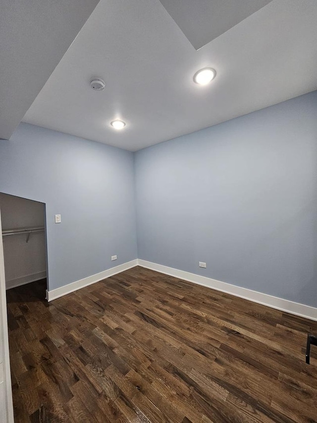 8809 S Lowe Ave, Chicago, IL 60620 - empty room with dark wood-type flooring, a smoke detector, and recessed lighting