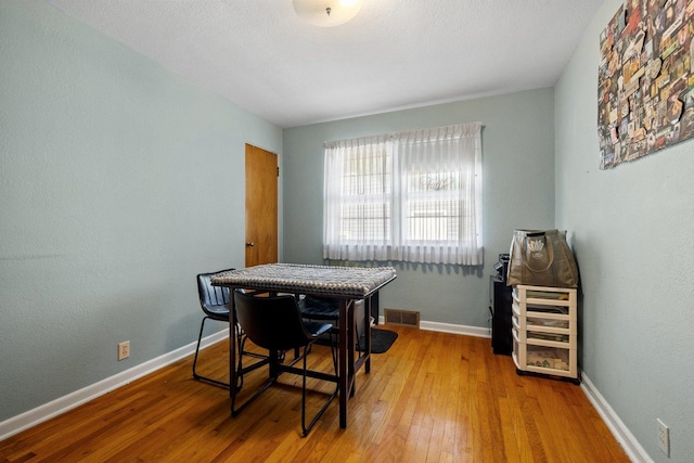 517 N William St, Joliet, IL 60435 - dining space featuring wood finished floors and baseboards