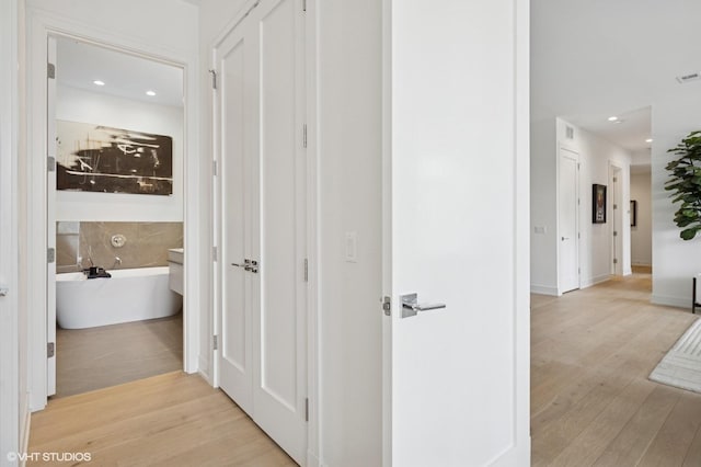 2405 W Iowa St Unit 206, Chicago, IL 60622 - corridor with wood finished floors and recessed lighting