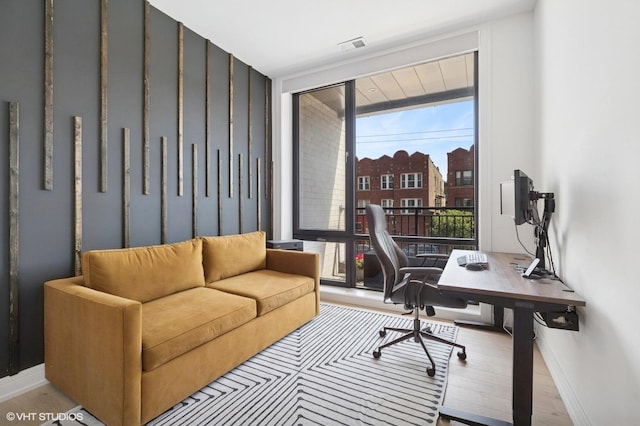 2405 W Iowa St Unit 206, Chicago, IL 60622 - home office with a wall of windows and wood finished floors