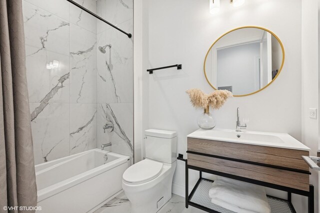 2405 W Iowa St Unit 206, Chicago, IL 60622 - bathroom featuring marble look tile flooring, shower / bath combination with curtain, and vanity