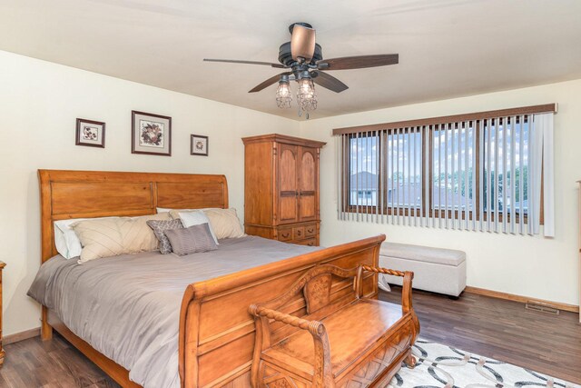 8712 Carriage Ln, Tinley Park, IL 60487 - bedroom featuring wood finished floors and a ceiling fan