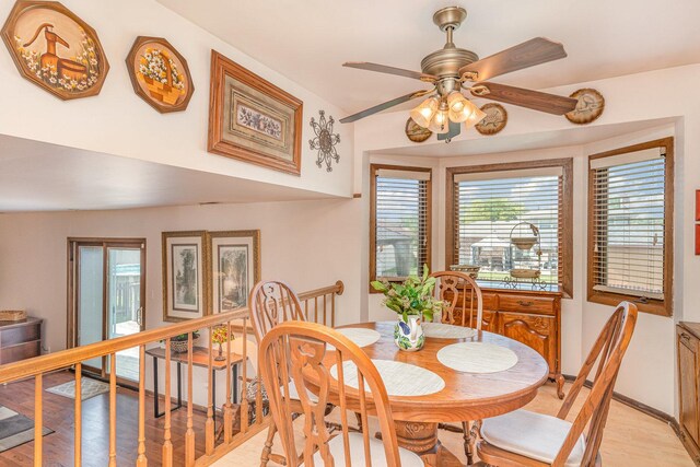 8712 Carriage Ln, Tinley Park, IL 60487 - dining room featuring light wood-style flooring and a ceiling fan