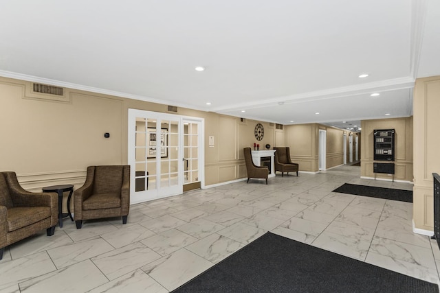 2909 N Sheridan Rd Unit 1601, Chicago, IL 60657 - community lobby with a decorative wall, recessed lighting, and crown molding