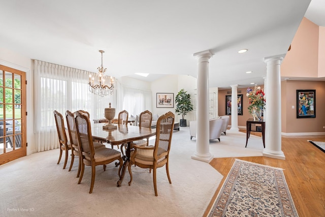 17 Ruffled Feathers Dr, Lemont, IL 60439 - dining space featuring ornate columns, light wood-style flooring, recessed lighting, and a chandelier