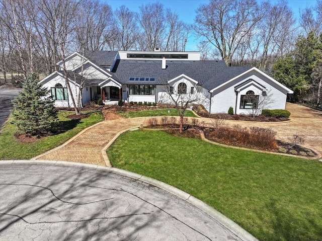 1417 Sherwood Ln, Geneva, IL 60134 - mid-century home featuring a front yard and a shingled roof