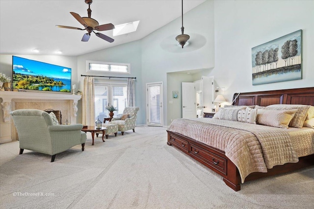 1417 Sherwood Ln, Geneva, IL 60134 - bedroom with light colored carpet, high vaulted ceiling, a skylight, access to exterior, and ceiling fan