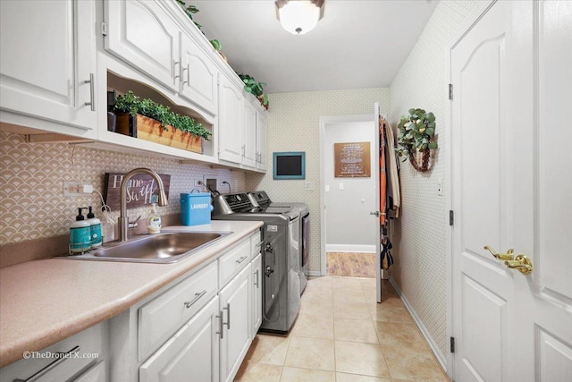 1417 Sherwood Ln, Geneva, IL 60134 - washroom with washing machine and clothes dryer, cabinet space, wallpapered walls, and light tile patterned floors