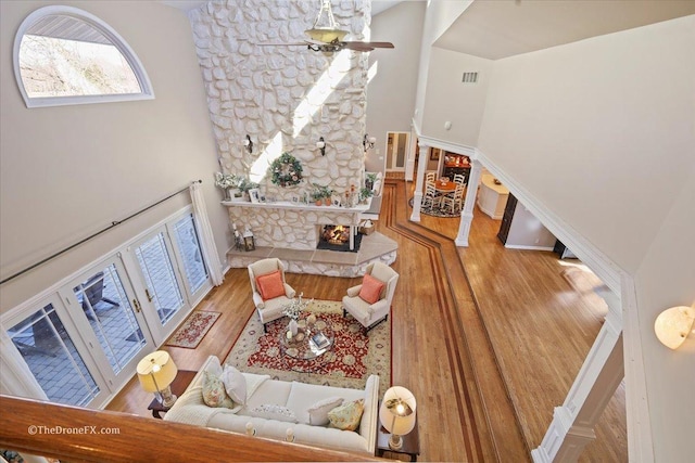 1417 Sherwood Ln, Geneva, IL 60134 - living area featuring a ceiling fan, wood finished floors, and a fireplace
