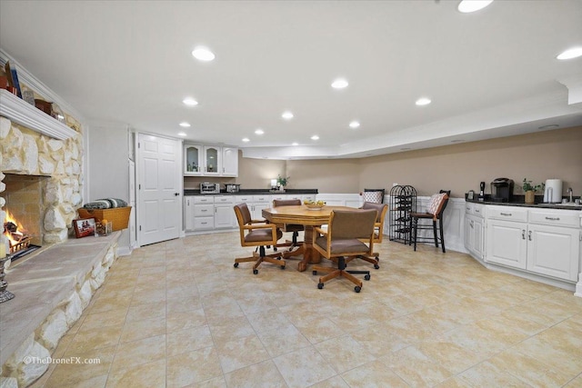 1417 Sherwood Ln, Geneva, IL 60134 - dining area with a stone fireplace, recessed lighting, and light tile patterned flooring