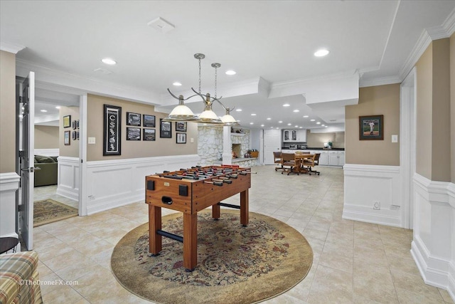 1417 Sherwood Ln, Geneva, IL 60134 - playroom featuring a wainscoted wall, a decorative wall, light tile patterned floors, ornamental molding, and recessed lighting