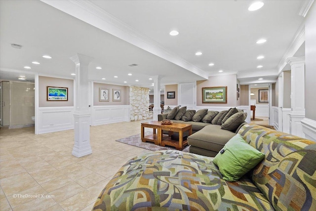 1417 Sherwood Ln, Geneva, IL 60134 - living room featuring decorative columns, a decorative wall, ornamental molding, light tile patterned flooring, and wainscoting