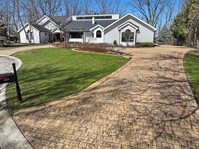 1417 Sherwood Ln, Geneva, IL 60134 - view of front of property featuring decorative driveway and a front yard
