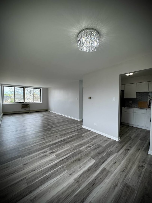 9720 S Pulaski Rd Unit 306, Oak Lawn, IL 60453 - unfurnished living room with a chandelier and wood finished floors