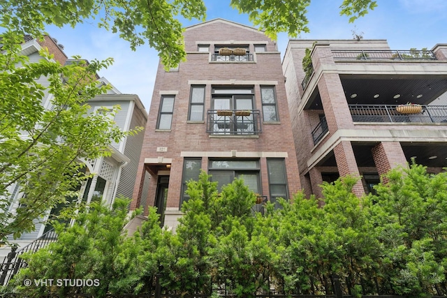 821 W Wrightwood Ave Unit 3, Chicago, IL 60614 - view of front of home with a balcony and brick siding