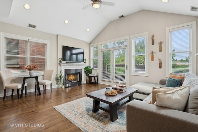821 W Wrightwood Ave Unit 3, Chicago, IL 60614 - living area featuring vaulted ceiling, a ceiling fan, wood finished floors, recessed lighting, and a warm lit fireplace