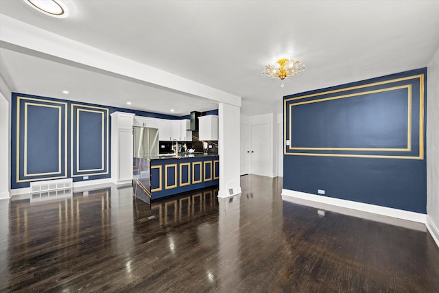8637 S Honore St, Chicago, IL 60620 - unfurnished room with dark wood-type flooring, a chandelier, and recessed lighting