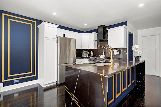 8637 S Honore St, Chicago, IL 60620 - kitchen with freestanding refrigerator, wall chimney range hood, stainless steel counters, dark wood-type flooring, and backsplash