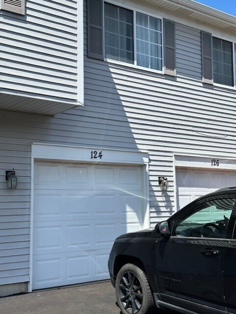 124 Village Creek Dr, Lake In The Hills, IL 60156 - view of side of property featuring a garage