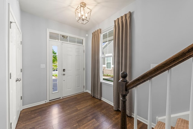 27W120 Timber Creek Dr, Winfield, IL 60190 - foyer entrance with dark wood-style flooring, a chandelier, and stairway