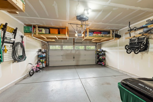 27W120 Timber Creek Dr, Winfield, IL 60190 - garage with baseboards and a garage door opener