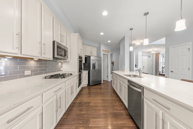 27W120 Timber Creek Dr, Winfield, IL 60190 - kitchen featuring stainless steel appliances, white cabinetry, backsplash, dark wood finished floors, and recessed lighting