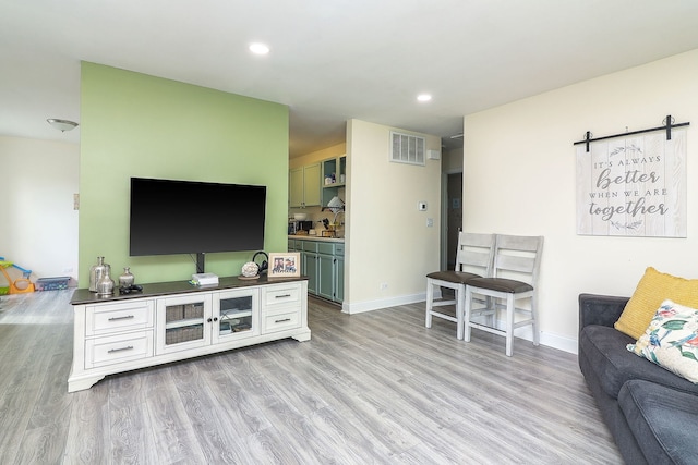 240 Algonquin Ct Unit A, Bolingbrook, IL 60440 - living area with light wood-type flooring, recessed lighting, and a barn door